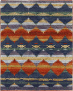 Pendleton Southwest hand-knotted wool rug with blue, terra cotta, and gold ombre patterns.