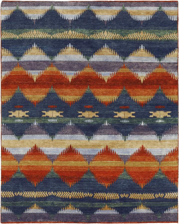 Pendleton Southwest hand-knotted wool rug with blue, terra cotta, and gold ombre patterns.