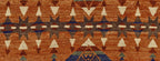 Pendleton TePee Southwest hand-knotted wool rug in burnt orange, brown, and tan with geometric patterns.