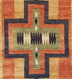 Pendleton hand-knotted wool rug with a Southwest Chimayo pattern in red, green, and blue.