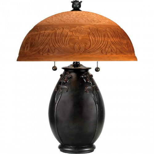 Glenhaven table lamp with etched amber art glass shade and sculpted dark bronze base.