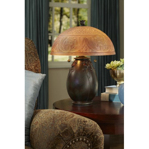 Glenhaven Art Nouveau table lamp with etched amber glass shade and sculpted bronze base.