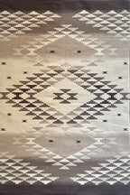 Pendleton Salt Creek flat-weave wool rug with a beige and brown Southwest geometric design.
