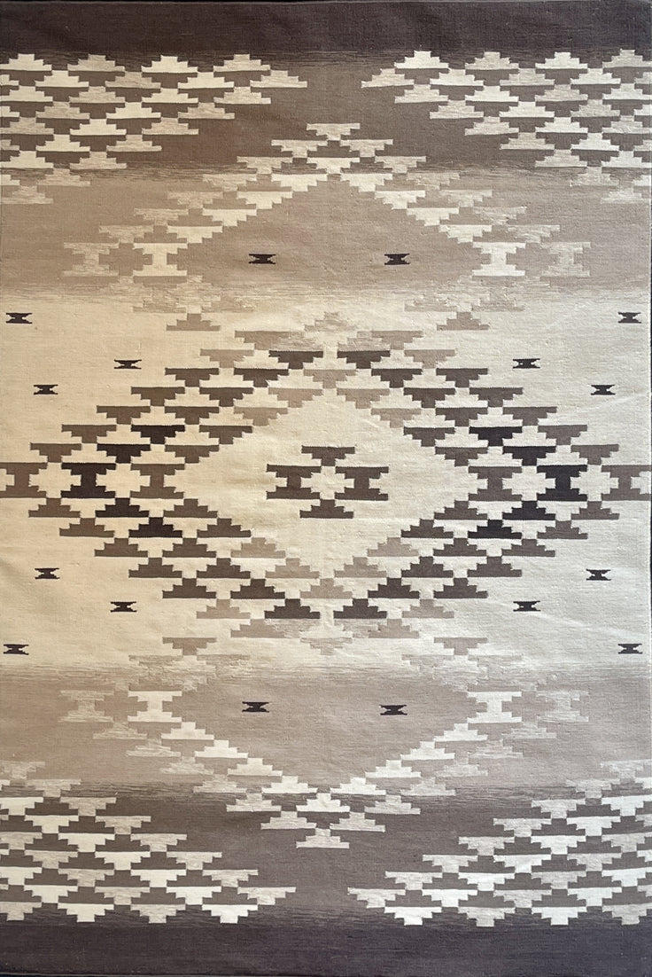 Pendleton Salt Creek flat-weave wool rug with a beige and brown Southwest geometric design.