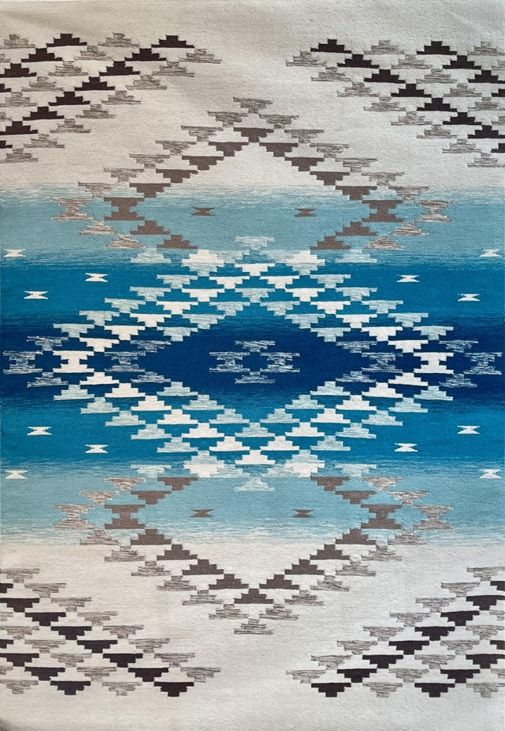 Pendleton Salt Creek turquoise wool rug with a Southwest geometric pattern.