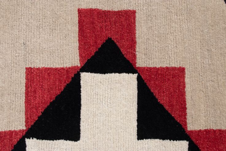 Los Lunas Southwest hand-knotted wool rug with red, black, and beige geometric patterns.