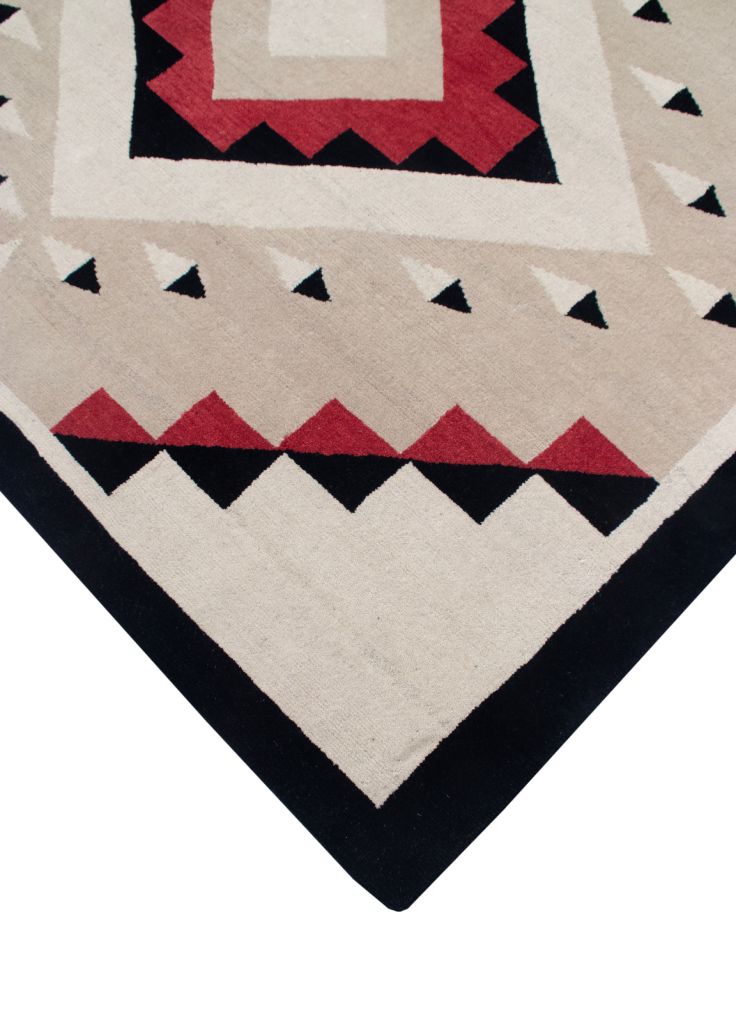 Los Lunas Southwest hand-knotted wool rug with red, black, and beige geometric patterns.
