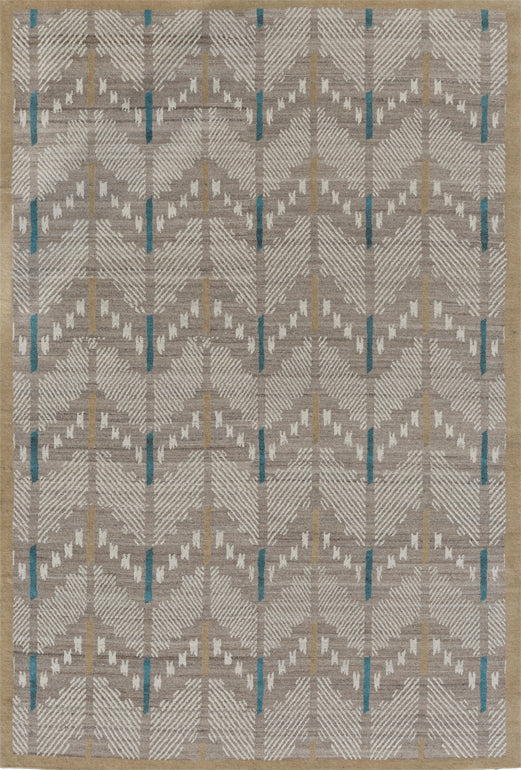 Los Alamos Southwest hand-knotted wool rug in tan and grey with turquoise accents.