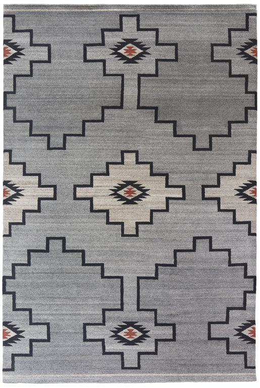 Los Ojos Southwest hand-knotted wool rug in grey with black and terracotta geometric patterns.