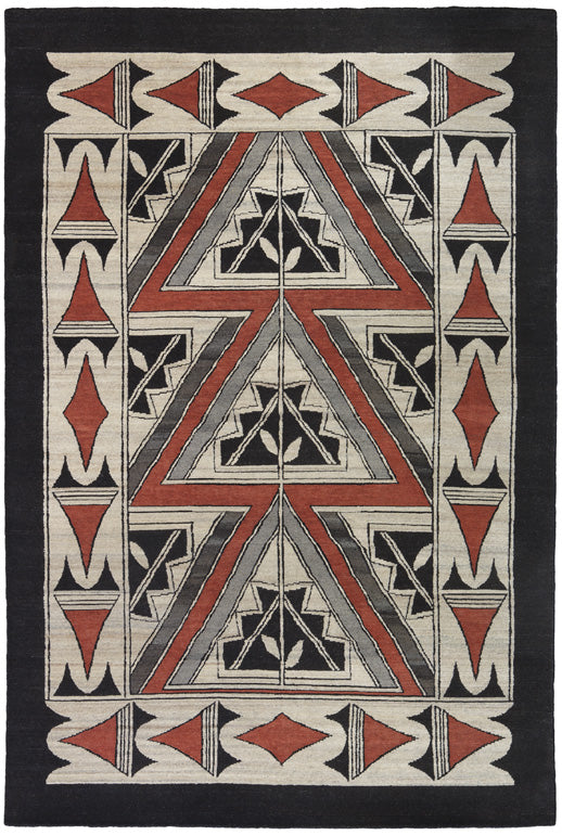 Black Hills Southwest hand-knotted wool rug with geometric patterns in terracotta, black, and cream.