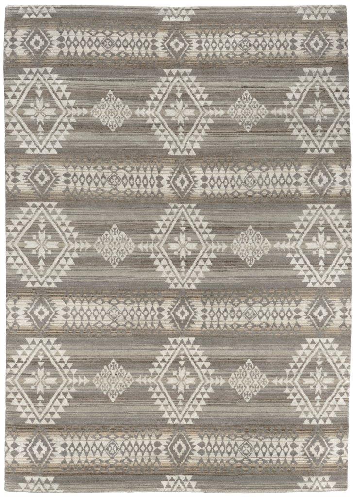 Pendleton Canyonlands hand-knotted wool rug with grey and beige Southwest geometric patterns.