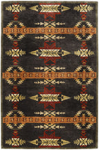 Pendleton Gatekeeper wool rug with Southwest patterns in charcoal, terra cotta, and gold.