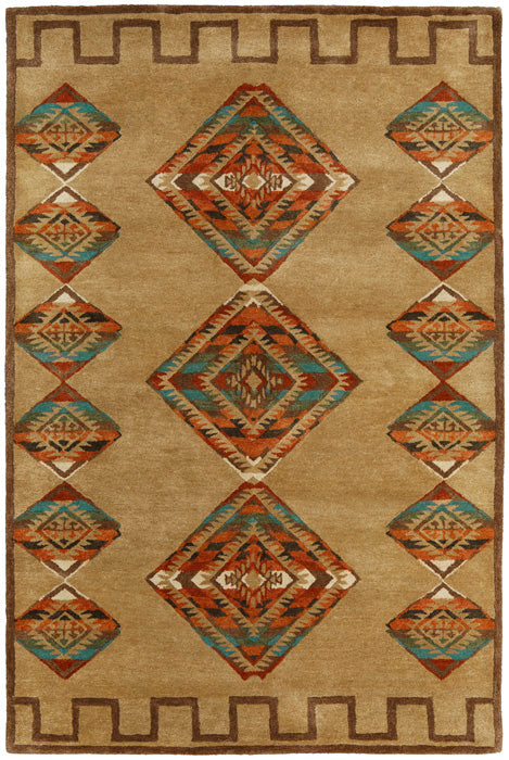Pendleton Desert Diamond wool rug with Southwest pattern in gold, terra cotta, and turquoise.