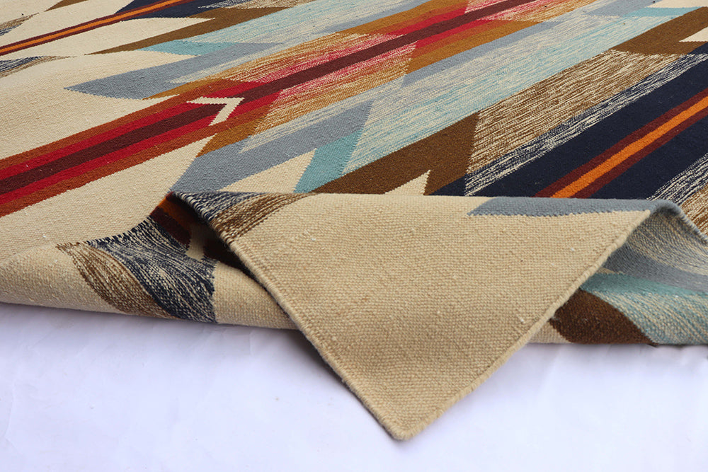 Pendleton Wyeth Trail wool flat-weave rug with a colorful Southwest arrow pattern