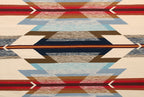 Pendleton Wyeth Trail wool rug with a colorful Southwest geometric arrow pattern.