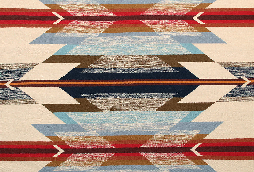 Pendleton Wyeth Trail wool rug with a colorful Southwest geometric arrow pattern.