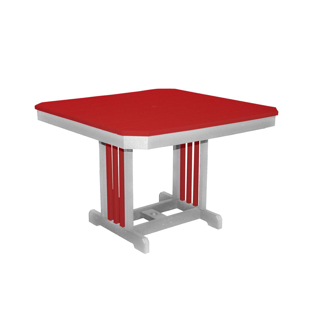 Square red and grey Mission style outdoor dining table with a sturdy pedestal base.
