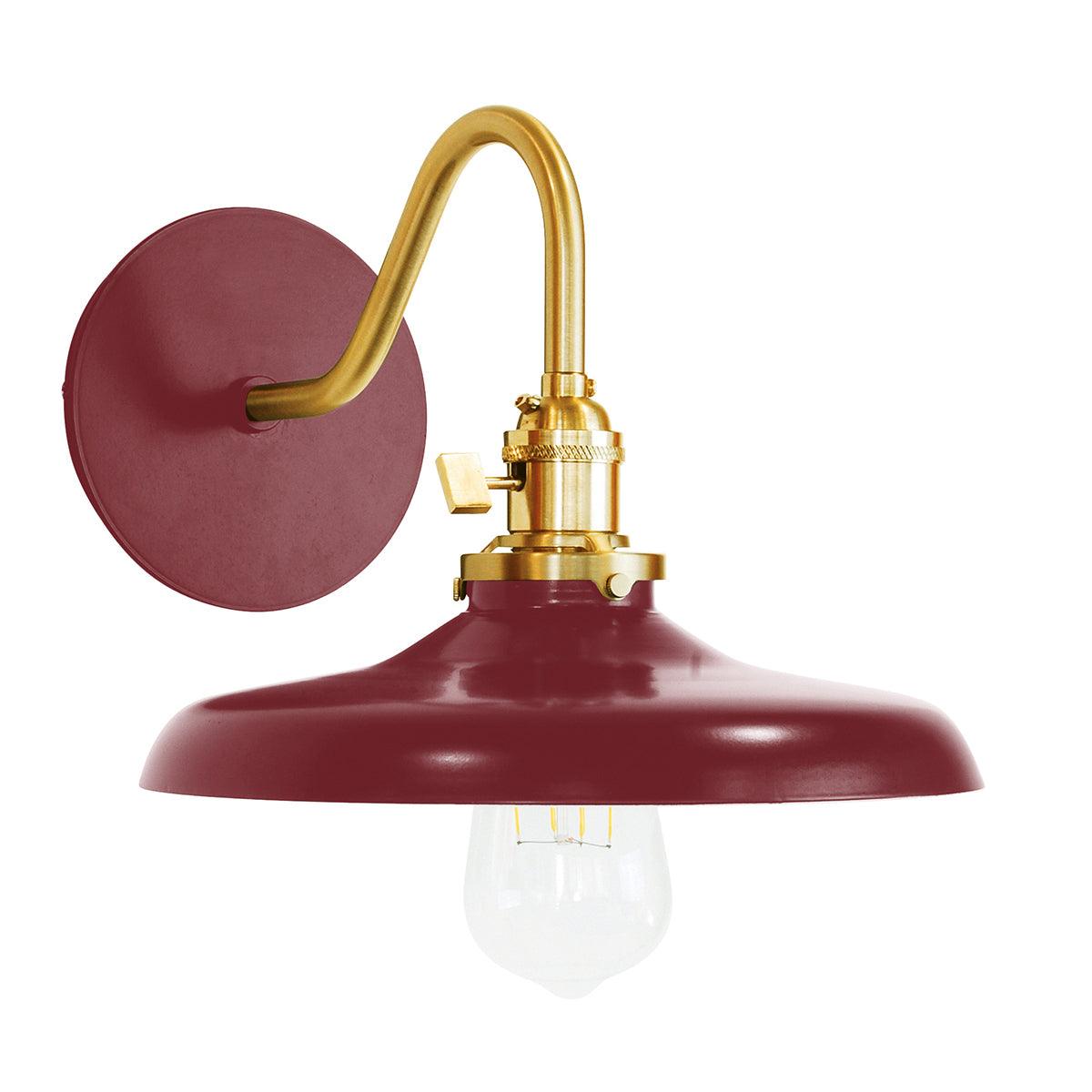 Uno Edison Gooseneck Arm Sconce in red and brass with an industrial metal shade and Edison bulb.