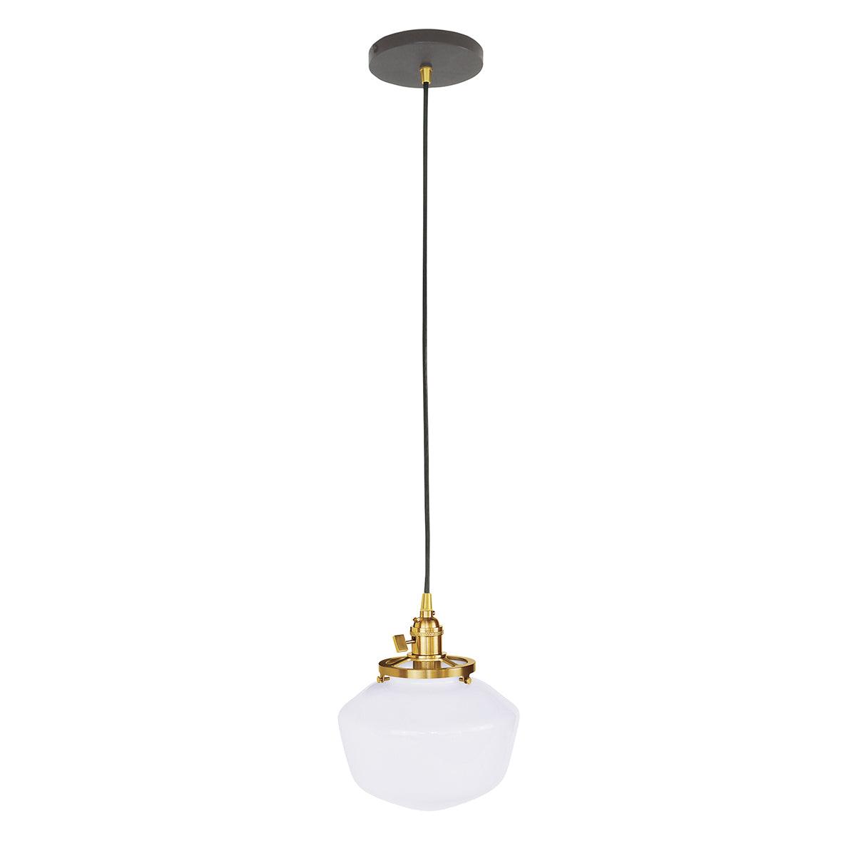 Uno Schoolhouse Pendant with white glass shade and brushed brass hardware.