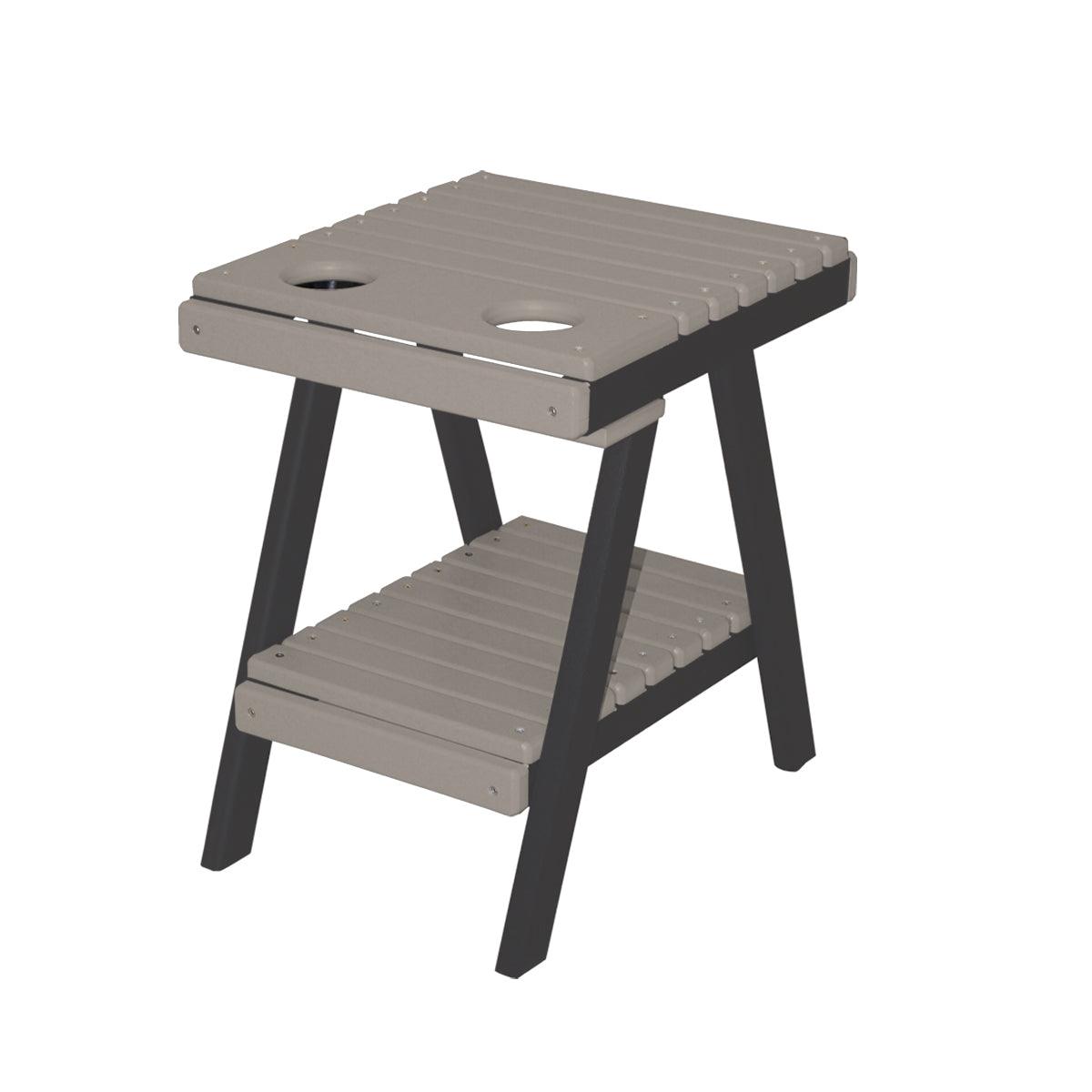 Two-tone grey and black slatted polylumber side table with built-in cup holders and lower shelf.