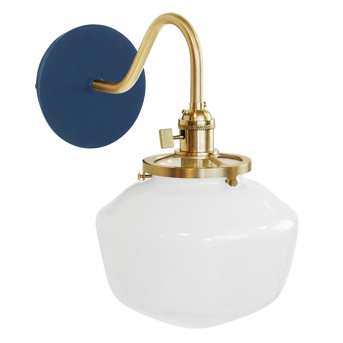 Uno Schoolhouse Gooseneck Sconce with blue backplate, brass arm, and white glass shade.