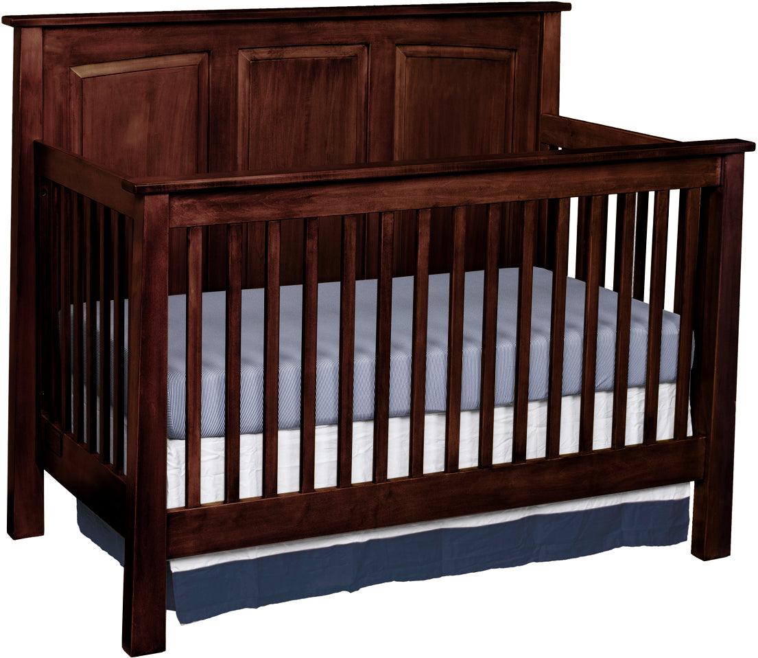 Dark wood Shaker convertible crib with a striped mattress on a white background.