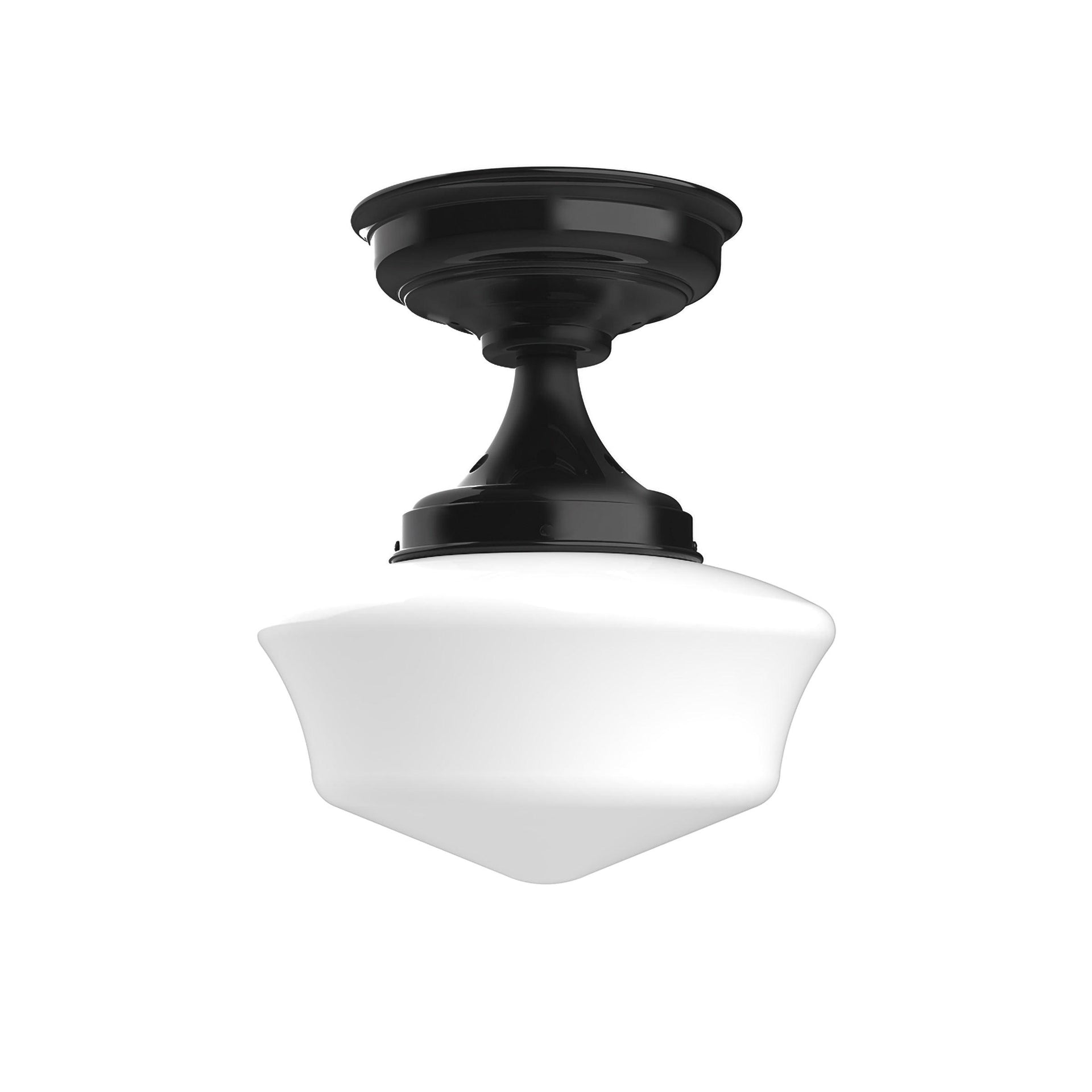 Schoolhouse flush mount light fixture with a black metal base and white milk glass shade.