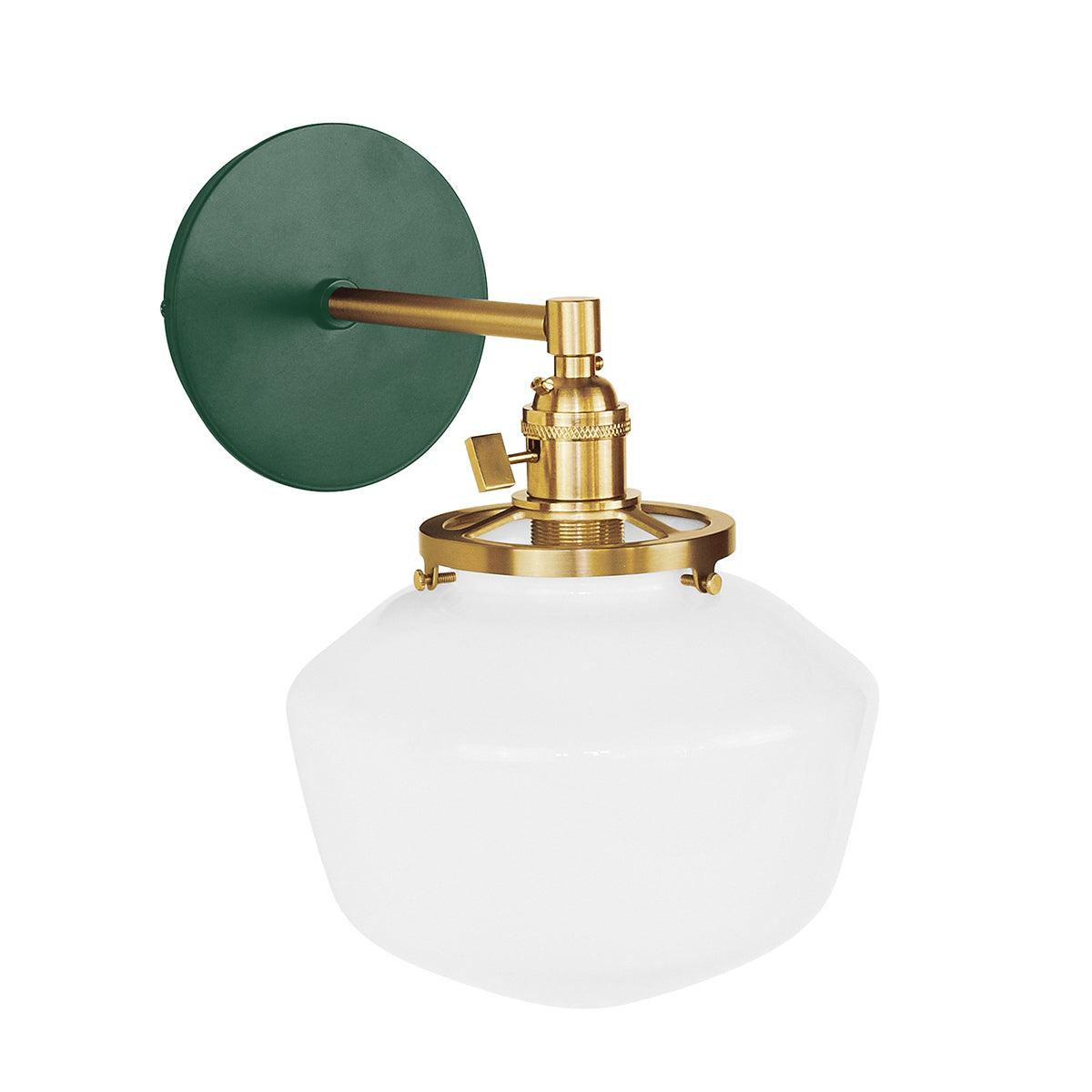 Uno Schoolhouse Straight Arm Sconce with green backplate, brass hardware, and white glass shade