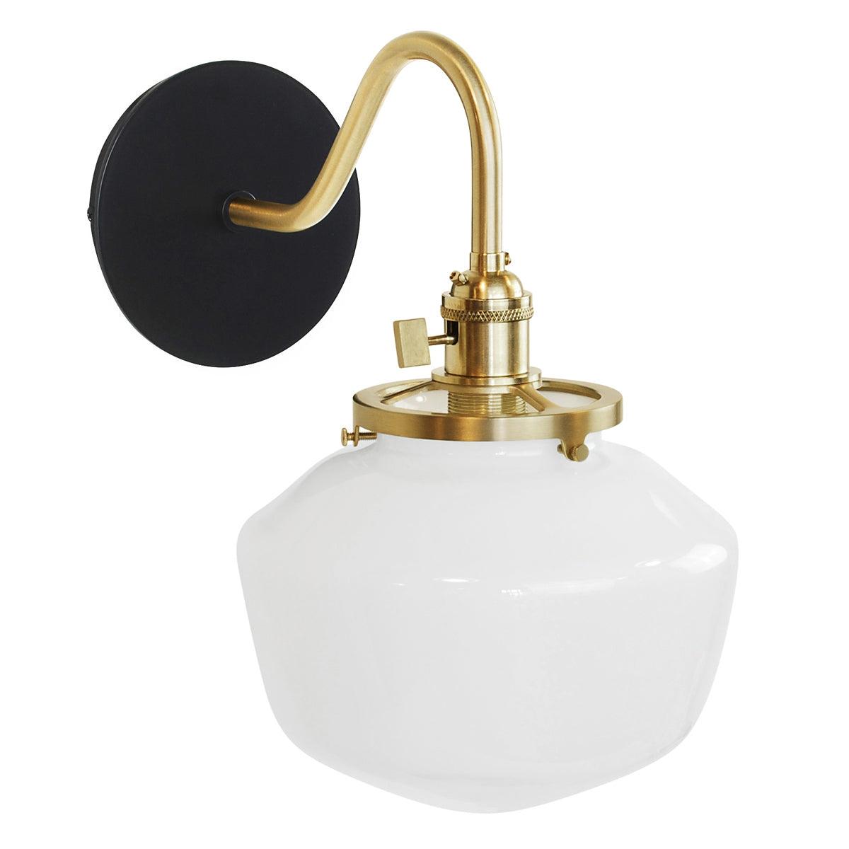 Uno Schoolhouse Gooseneck Sconce with brass arm, black backplate, and white glass shade.